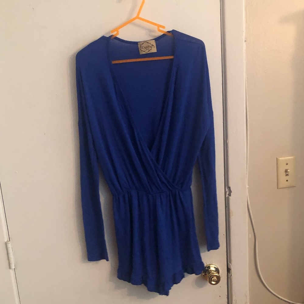 A Deja Vu brand, royal blue, long sleeve romper.